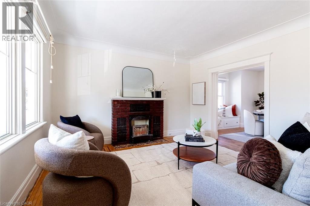 58 Edgemont Street N, Hamilton, ON - Indoor Photo Showing Living Room With Fireplace