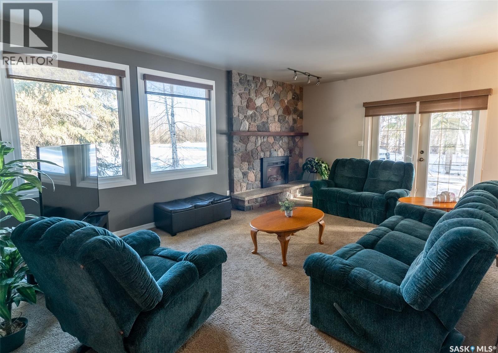 706 2Nd Avenue, Borden, SK - Indoor Photo Showing Living Room With Fireplace