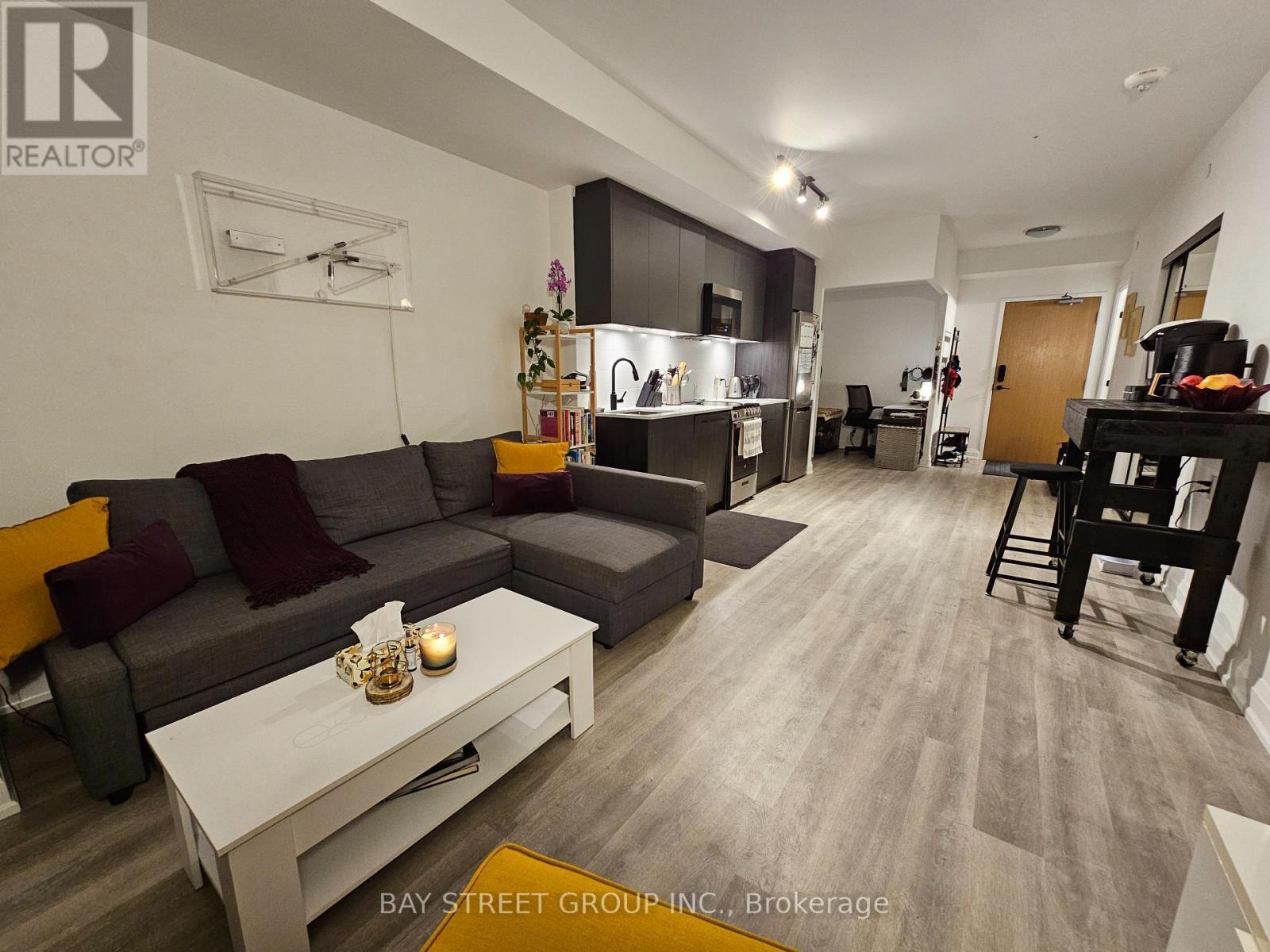 801 - 2369 Danforth Avenue, Toronto, ON - Indoor Photo Showing Living Room