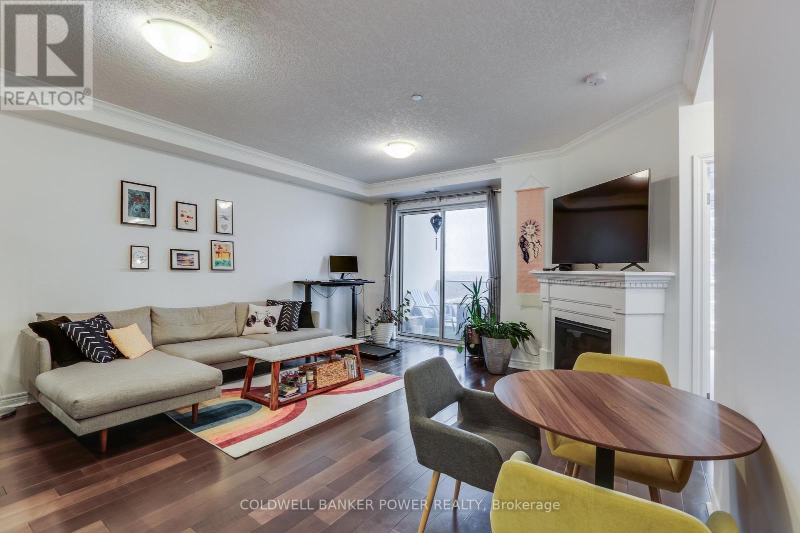 1311 - 330 Ridout Street N, London East (East K), ON - Indoor Photo Showing Living Room With Fireplace