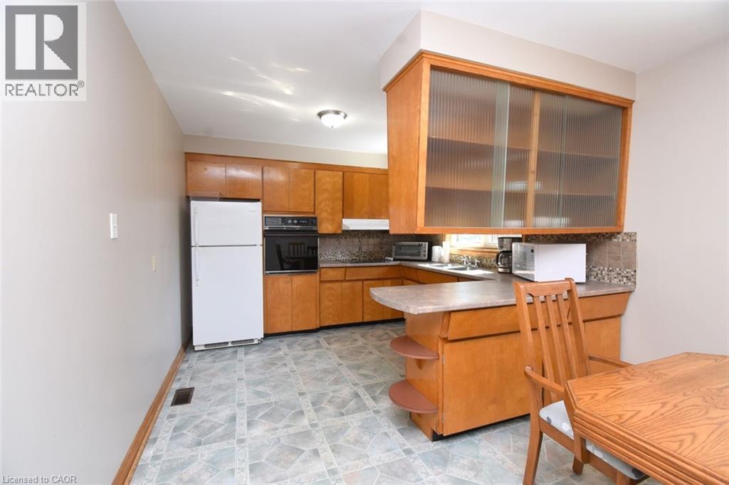 142 Delmar Drive, Hamilton, ON - Indoor Photo Showing Kitchen With Double Sink