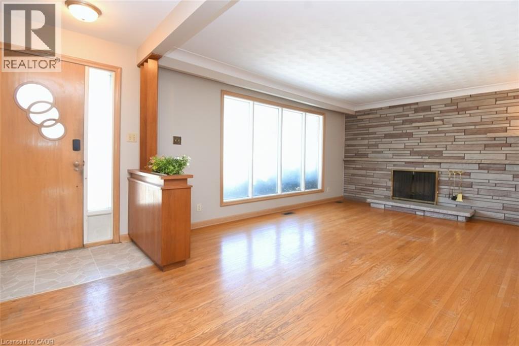 142 Delmar Drive, Hamilton, ON - Indoor Photo Showing Other Room With Fireplace