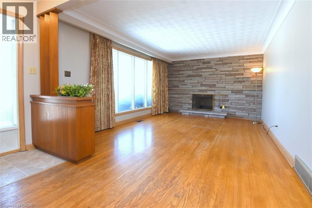 142 Delmar Drive, Hamilton, ON - Indoor With Fireplace