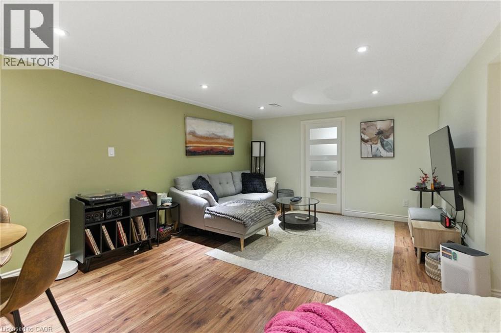 Living area with light wood finished floors and recessed lighting - 90 Toby Crescent Unit# Lower, Hamilton, ON - Indoor