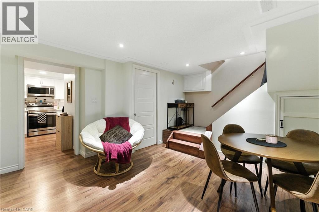 Living/Dining area featuring light wood finished floors, recessed lighting, and stairway - 90 Toby Crescent Unit# Lower, Hamilton, ON - Indoor