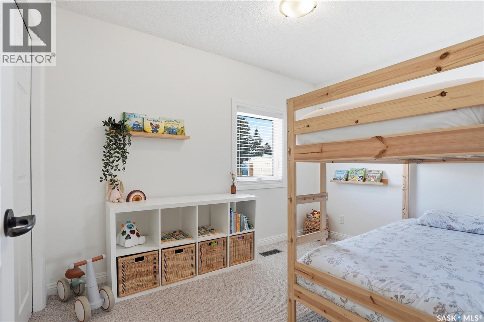 154 Candle Crescent, Saskatoon, SK - Indoor Photo Showing Bedroom