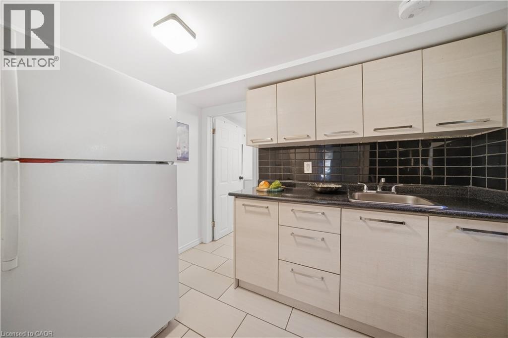 Kitchen. 2nd Floor, Ceramic Flooring, Gas Stove, Hard Wired Smoke Detectors - 107 Queen Street S, Hamilton, ON - Indoor Photo Showing Kitchen
