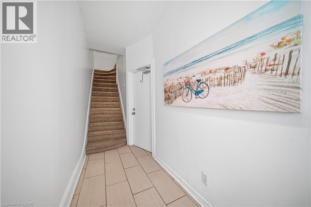 Foyer. Ceramic Floors, High Ceilings 9ft! - 107 Queen Street S, Hamilton, ON - Indoor Photo Showing Other Room