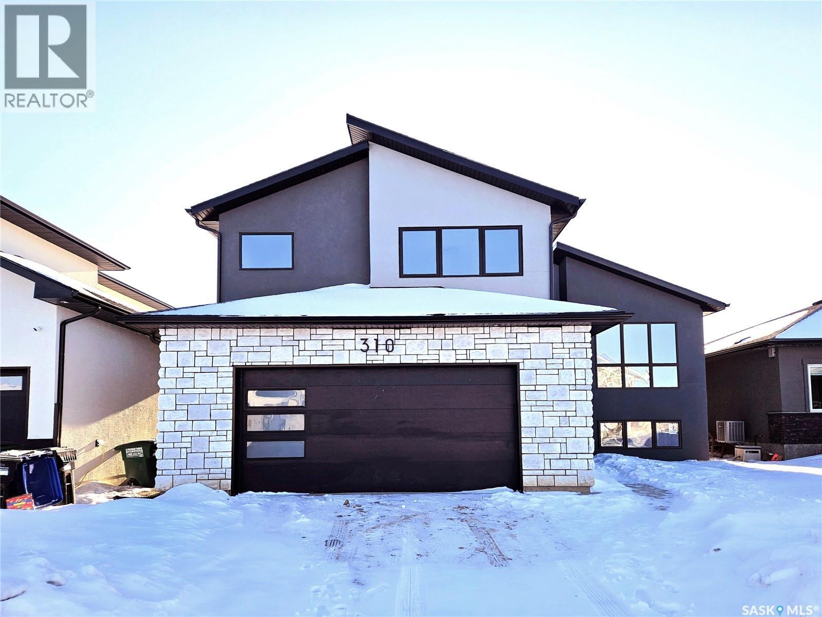 310 Flynn Manor, Saskatoon, SK - Outdoor With Exterior