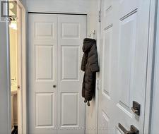 Front entrance with new closet door -