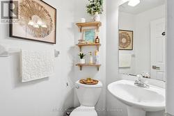 MAIN FLOOR POWDER ROOM -