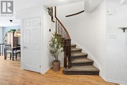 CIRCULAR STAIRCASE WITH STORAGE CLOSET TO THE LEFT -