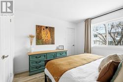 PRIMARY BEDROOM WITH WALK-IN CLOSET -