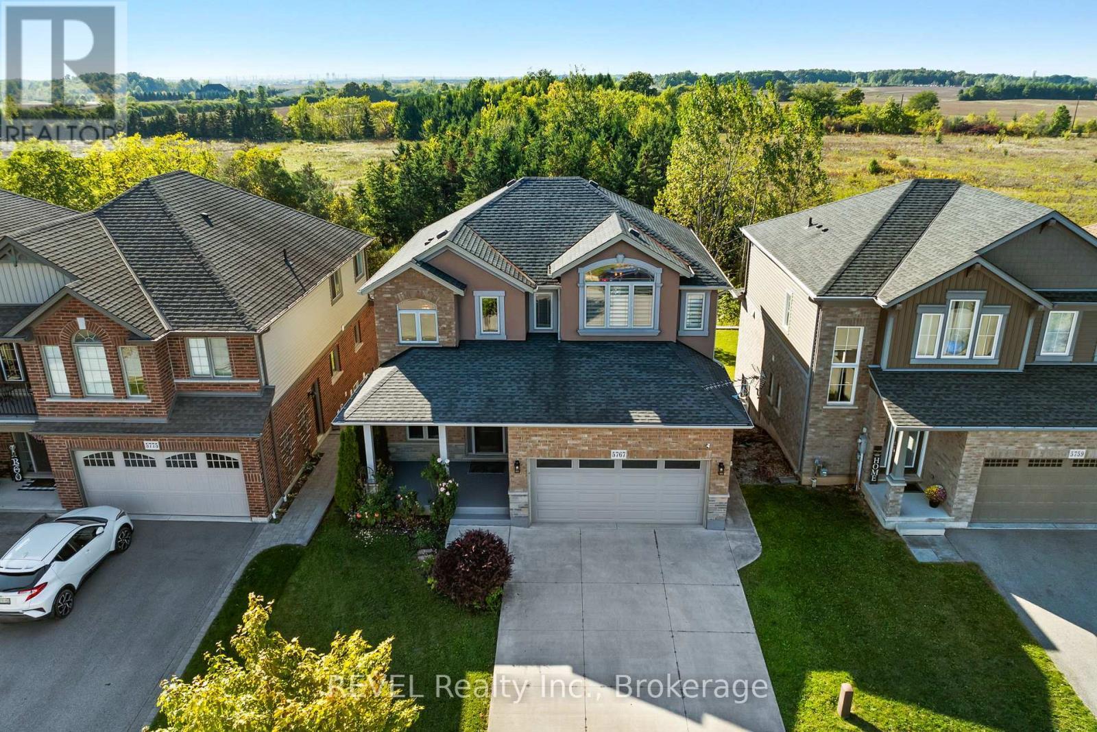5767 Osprey Avenue, Niagara Falls (Forestview), ON - Outdoor With Deck Patio Veranda With Facade