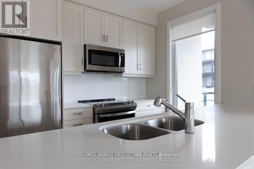 105 - 130 Boundstone Way, Ottawa, ON - Indoor Photo Showing Kitchen With Double Sink