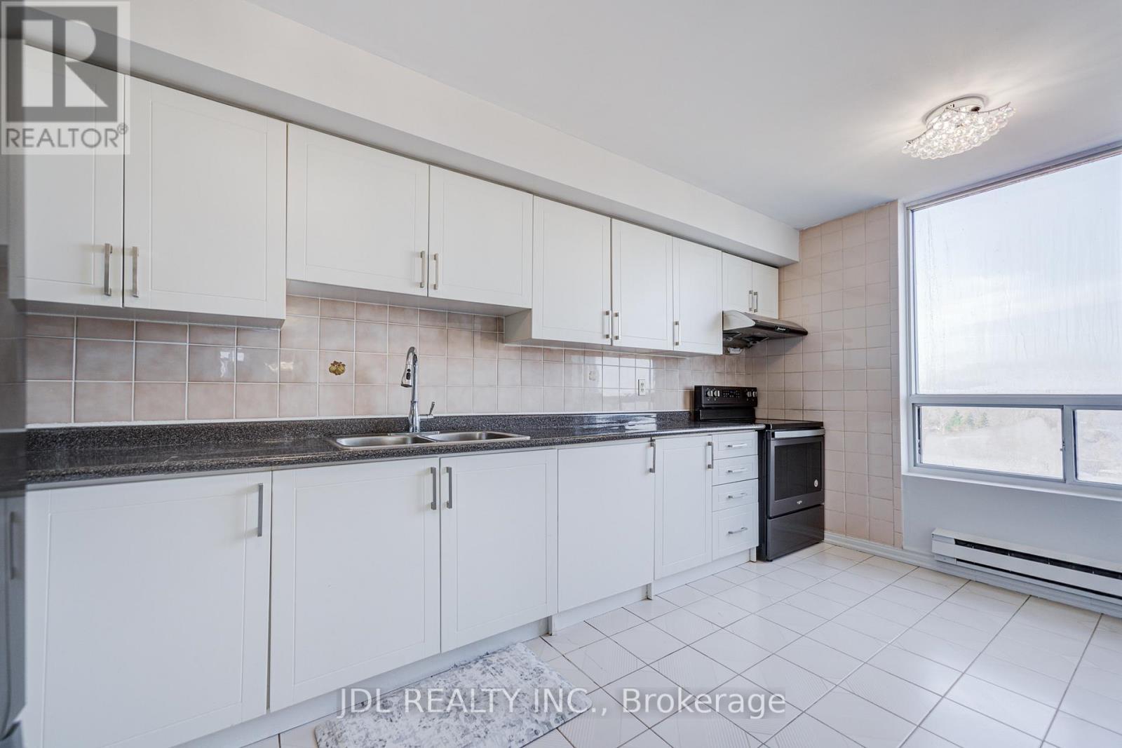 1106 - 1 Reidmount Avenue, Toronto, ON - Indoor Photo Showing Kitchen With Double Sink