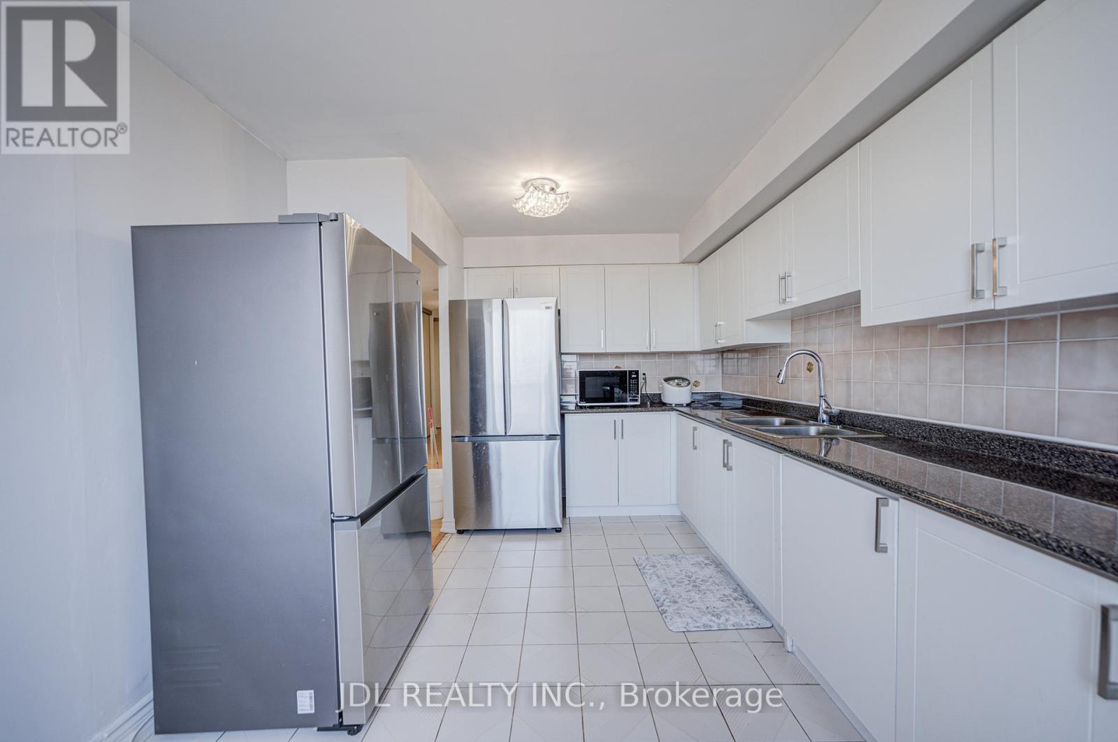 1106 - 1 Reidmount Avenue, Toronto, ON - Indoor Photo Showing Kitchen With Double Sink