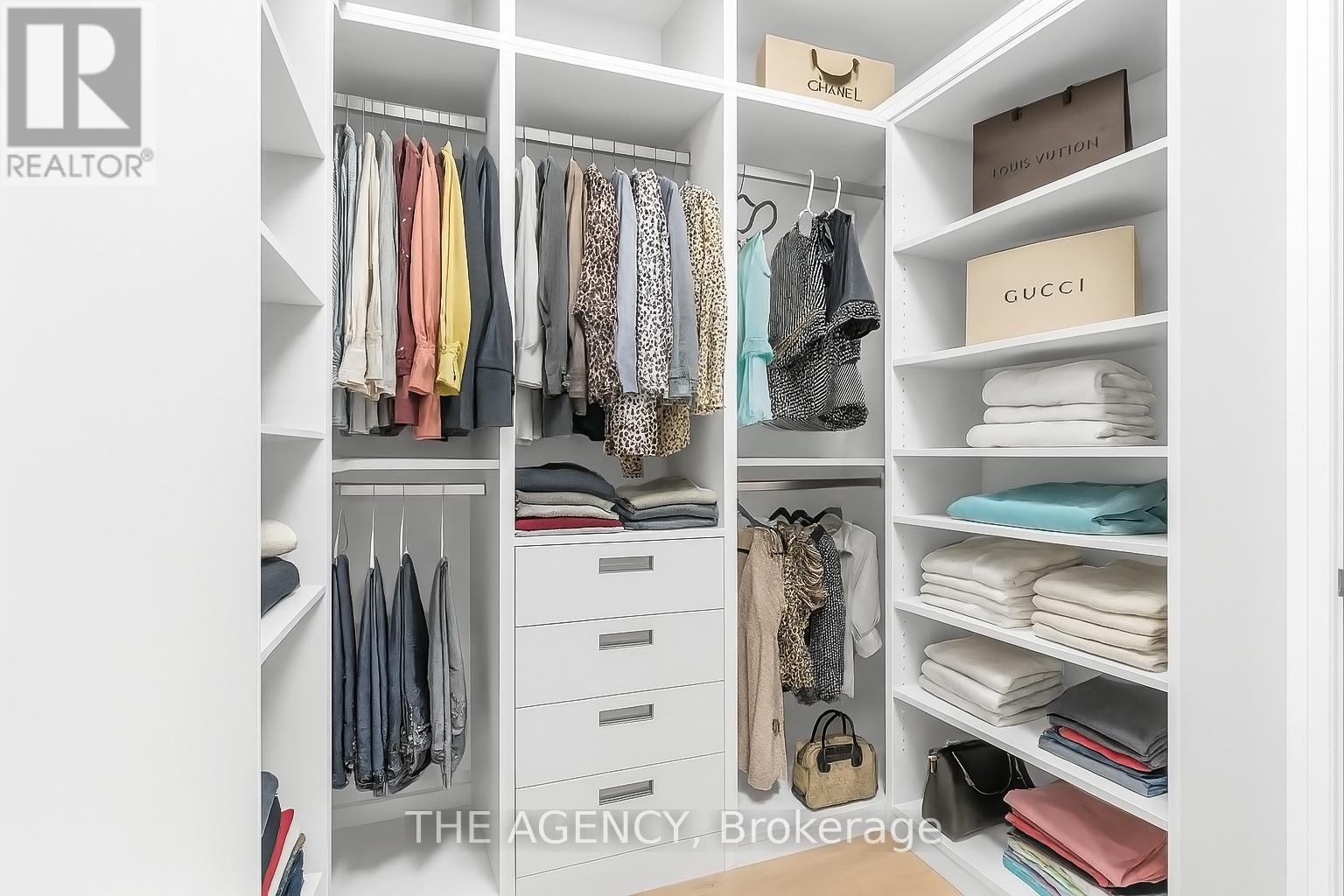 LED lit Primary Walk-in closet w/skylight - 9 Earl Street, Mississauga, ON - Indoor With Storage