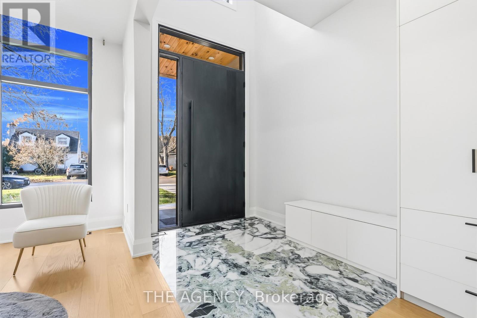 9ft door entrance w/book matched large slabs - 9 Earl Street, Mississauga, ON - Indoor Photo Showing Bedroom