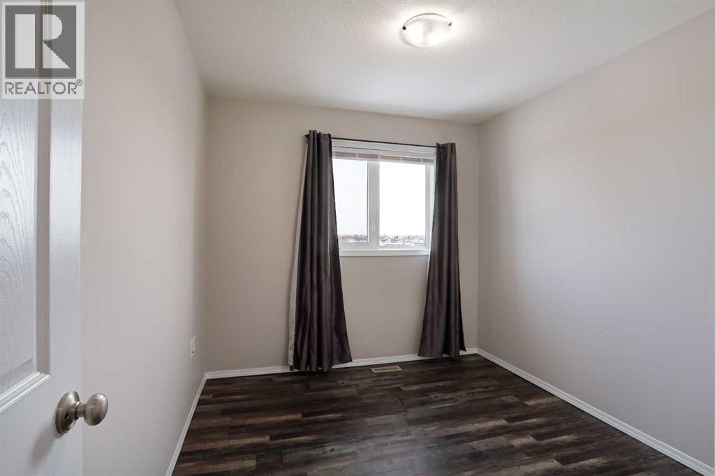 Top Floor - 3rd Bedroom - 322 17 Street E, Brooks, AB - Indoor Photo Showing Other Room