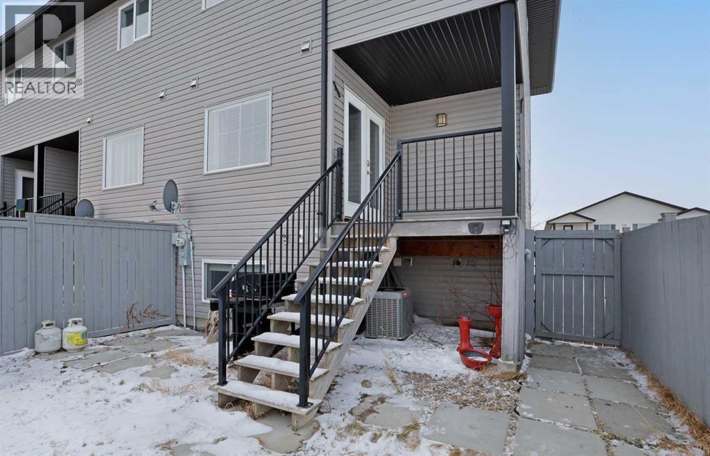 Covered Back Deck - A/C under deck - 322 17 Street E, Brooks, AB - Outdoor