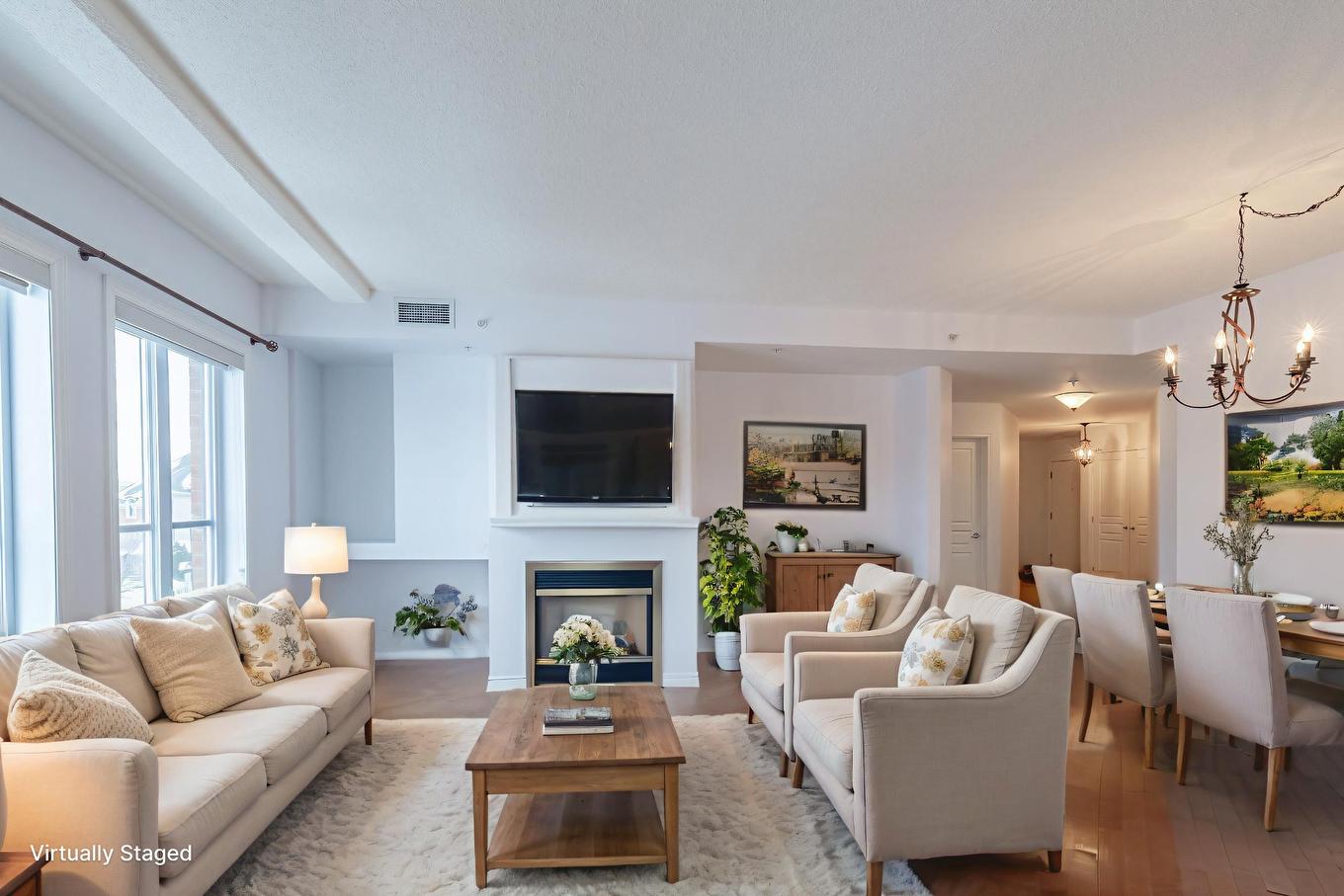 Living room - 302-5200 Av. Colomb, Brossard, QC - Indoor Photo Showing Living Room With Fireplace