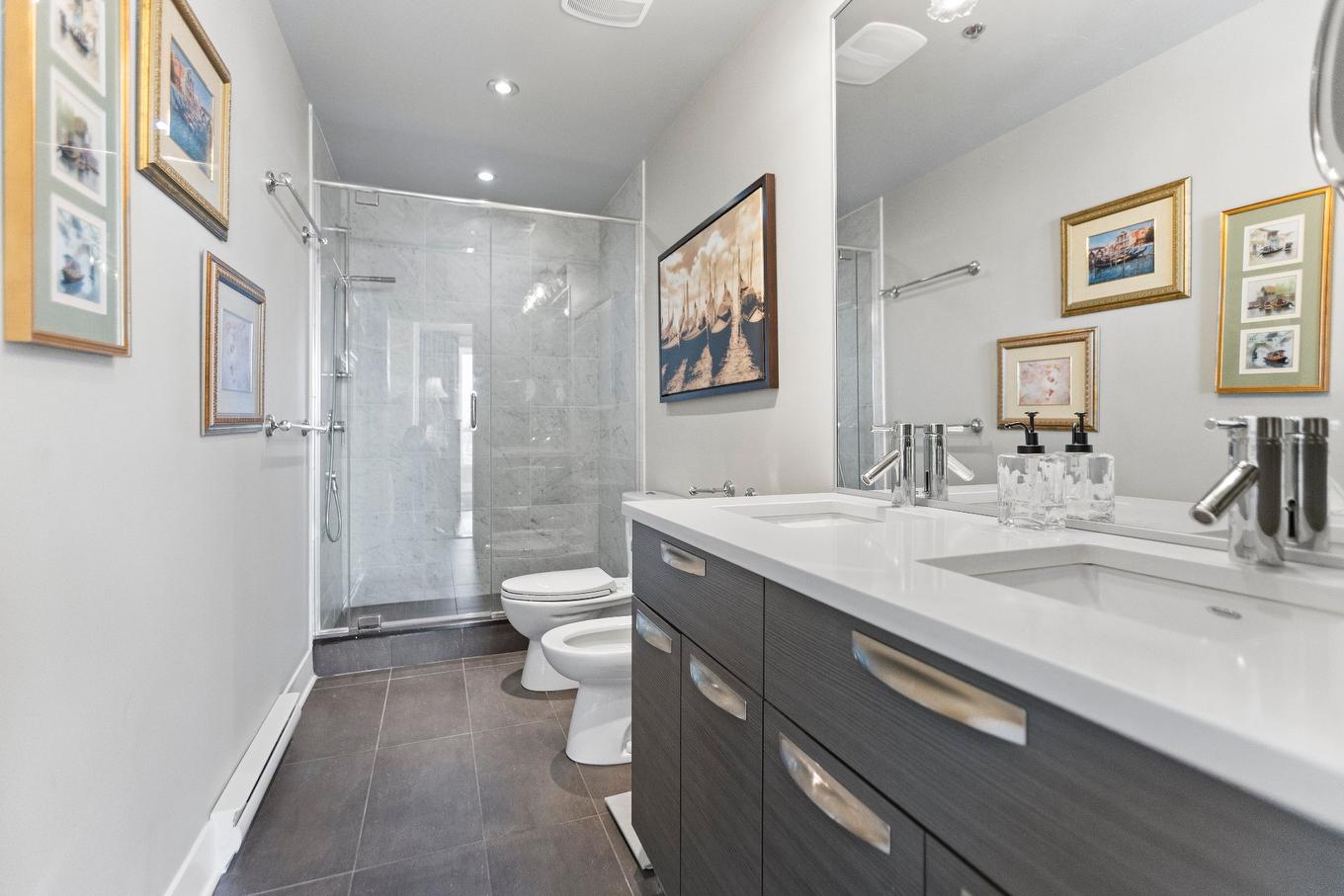 Salle de bains attenante à la CCP - 409-795 Ch. Du Bord-Du-Lac-Lakeshore, Dorval, QC - Indoor Photo Showing Bathroom