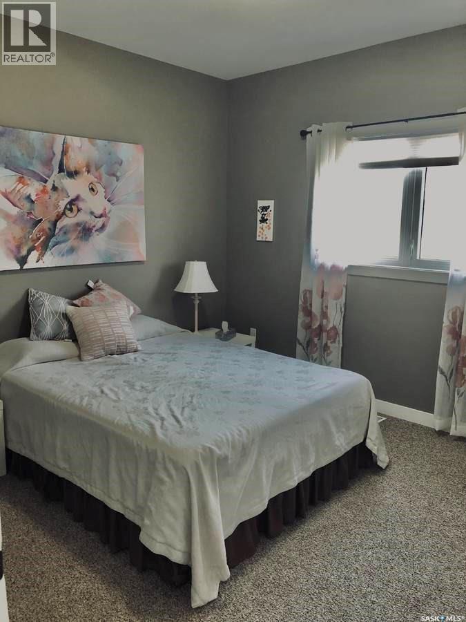 9 Warren Street S, Redvers, SK - Indoor Photo Showing Bedroom