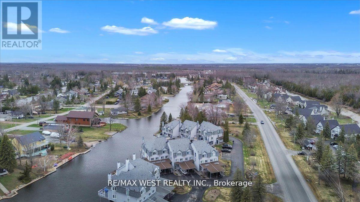 9 - 24 Laguna Parkway, Ramara, ON - Outdoor With Body Of Water With View