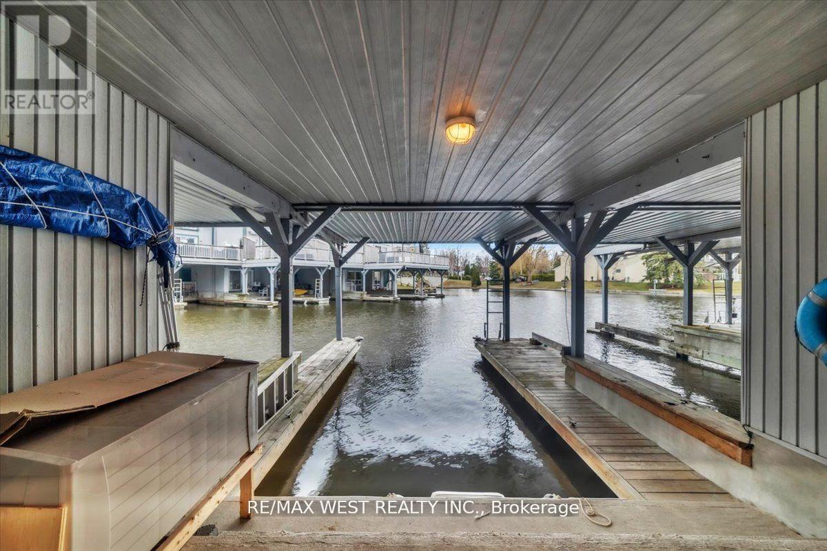 9 - 24 Laguna Parkway, Ramara, ON - Outdoor With Body Of Water