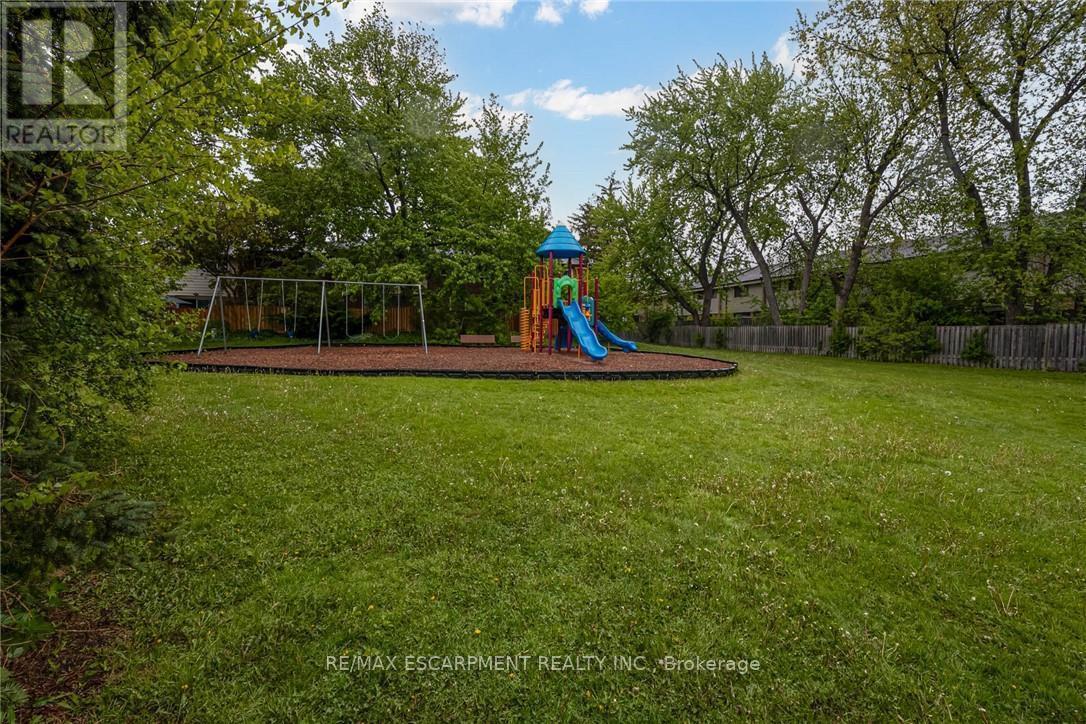 48 - 2825 Gananoque Drive, Mississauga, ON - Outdoor With Backyard