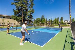 205-600 Sarsons Road, Kelowna, BC - Outdoor With In Ground Pool With Backyard