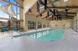 205-600 Sarsons Road, Kelowna, BC - Indoor Photo Showing Other Room With In Ground Pool