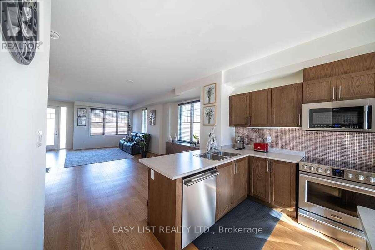 49 Prince William Boulevard, Clarington, ON - Indoor Photo Showing Kitchen With Double Sink