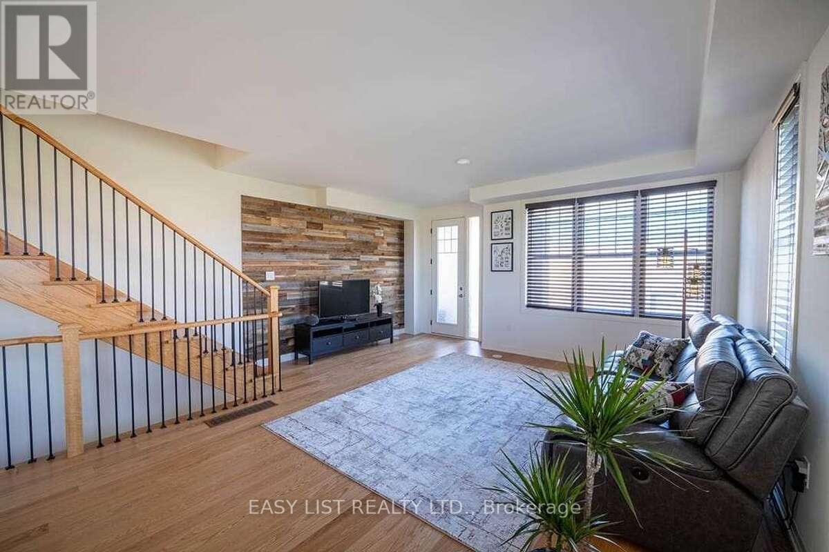 49 Prince William Boulevard, Clarington, ON - Indoor Photo Showing Living Room With Fireplace