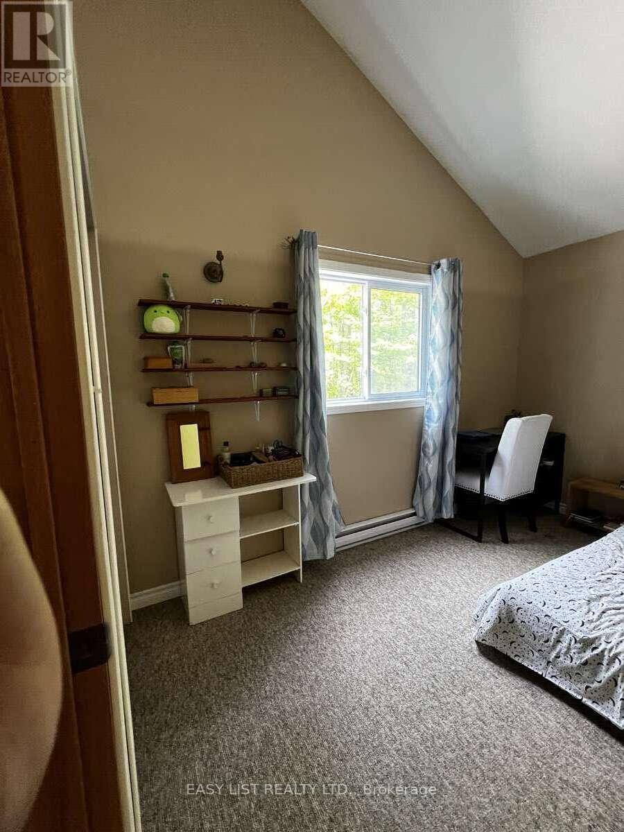 2135 Champlain Road, Tiny, ON - Indoor Photo Showing Bedroom