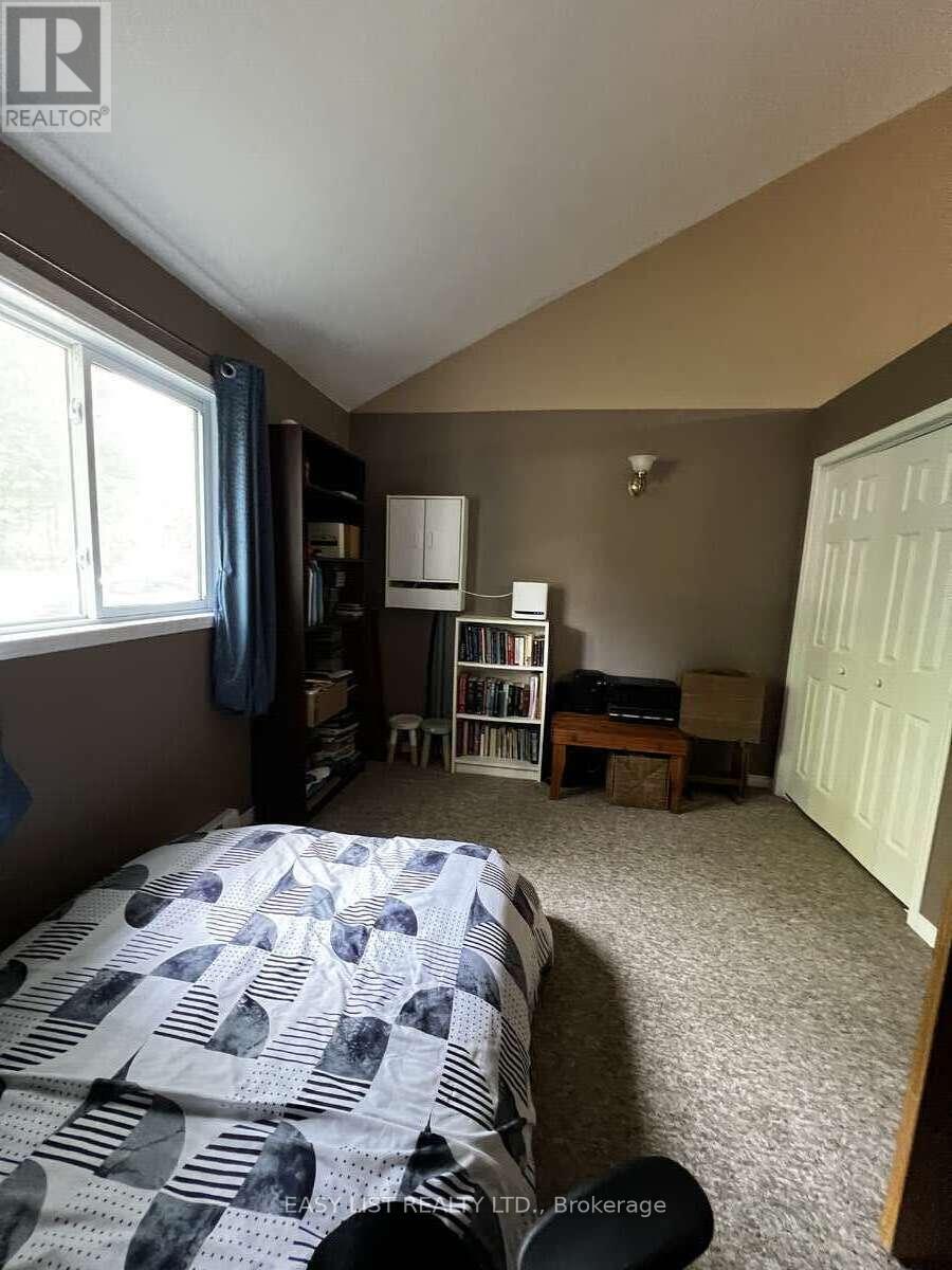 2135 Champlain Road, Tiny, ON - Indoor Photo Showing Bedroom