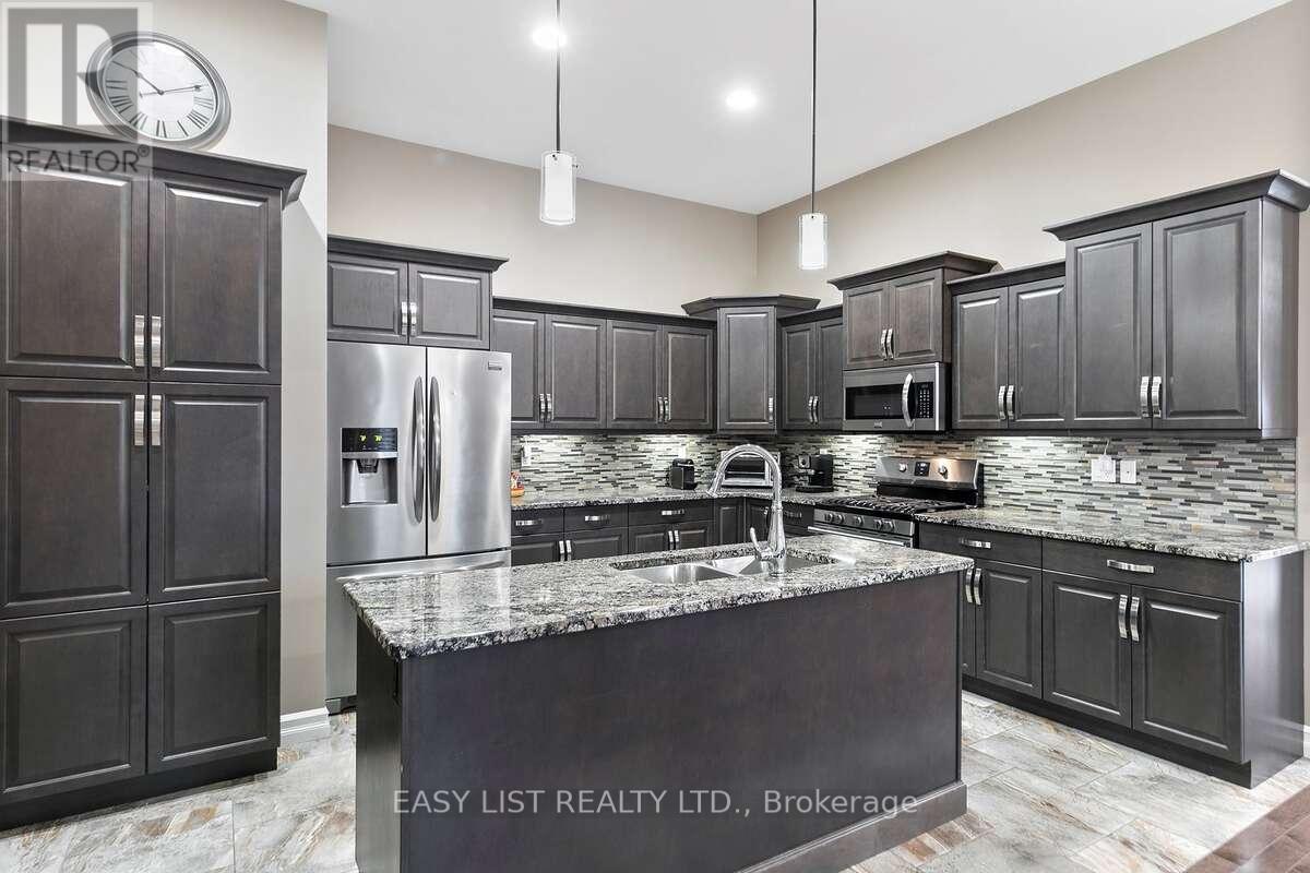 1160 Alliance Street, Lasalle, ON - Indoor Photo Showing Kitchen With Double Sink With Upgraded Kitchen