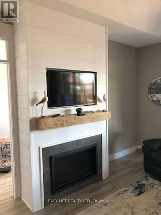 2 Creek Side Place, Lambton Shores, ON - Indoor Photo Showing Living Room With Fireplace