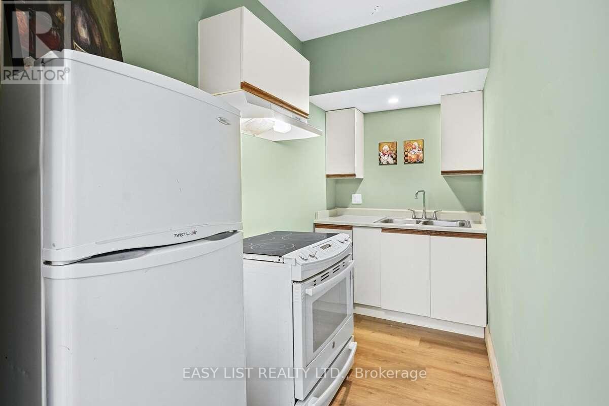 44 Trent River Road S, Kawartha Lakes, ON - Indoor Photo Showing Kitchen With Double Sink