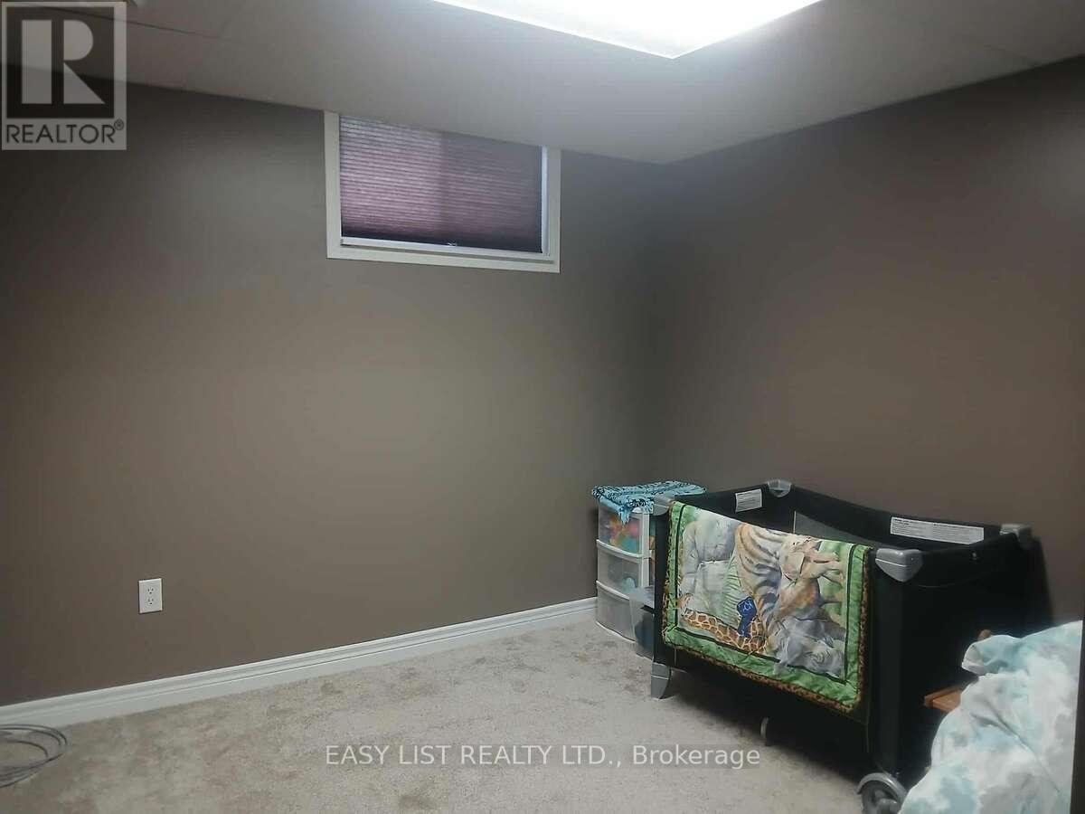 7652 Harris Point Drive, Plympton-Wyoming, ON - Indoor Photo Showing Bedroom