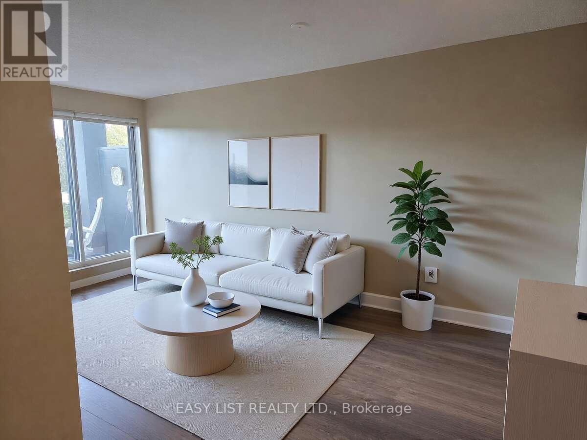 203 - 155 Main Street N, Newmarket, ON - Indoor Photo Showing Living Room