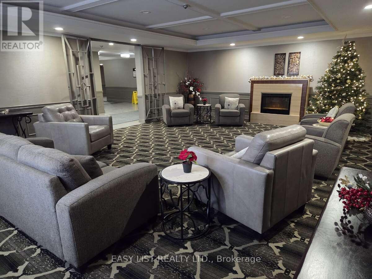 203 - 155 Main Street N, Newmarket, ON - Indoor With Fireplace