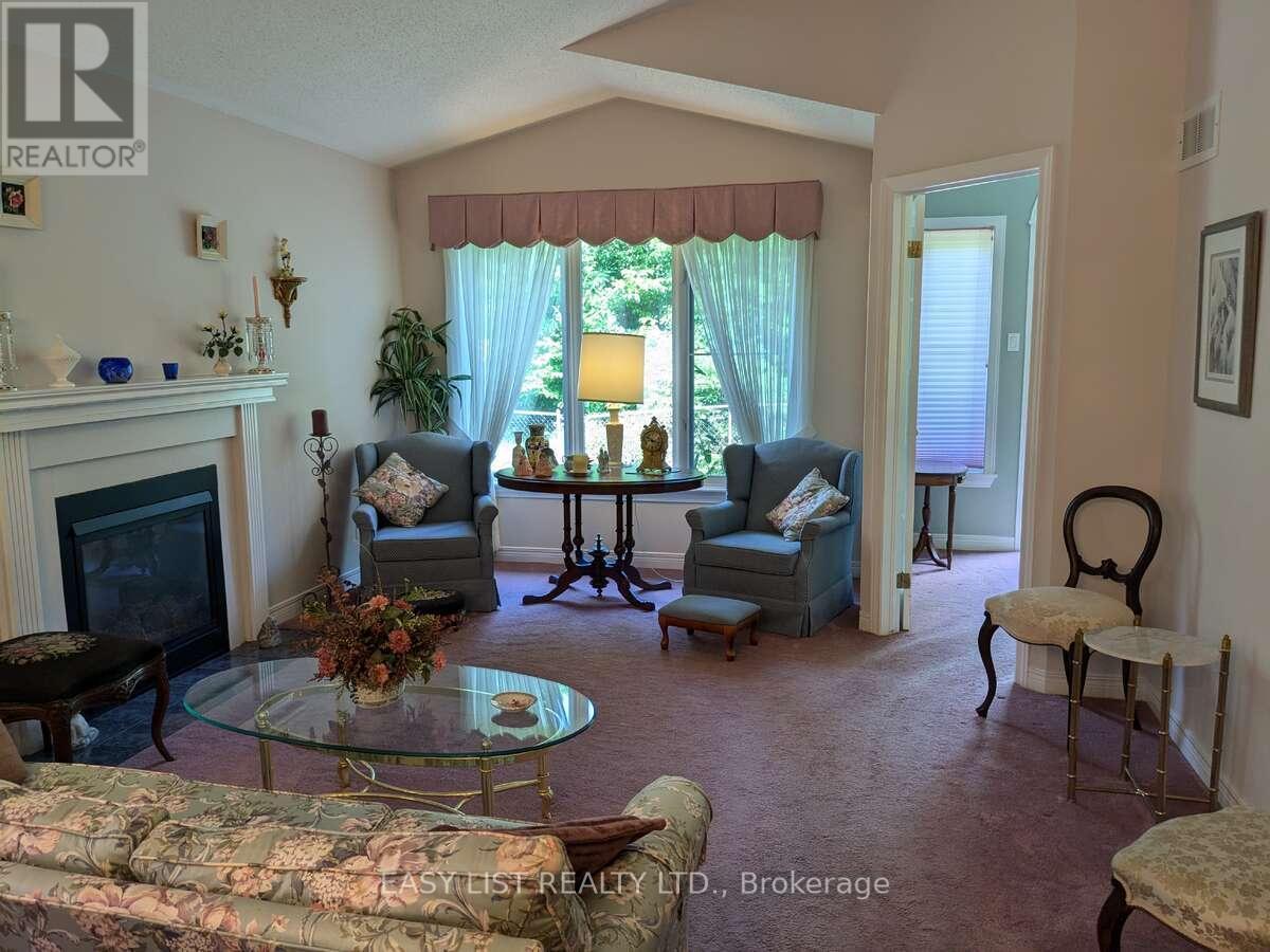 57 Goldfinch Drive, Ottawa, ON - Indoor Photo Showing Living Room With Fireplace