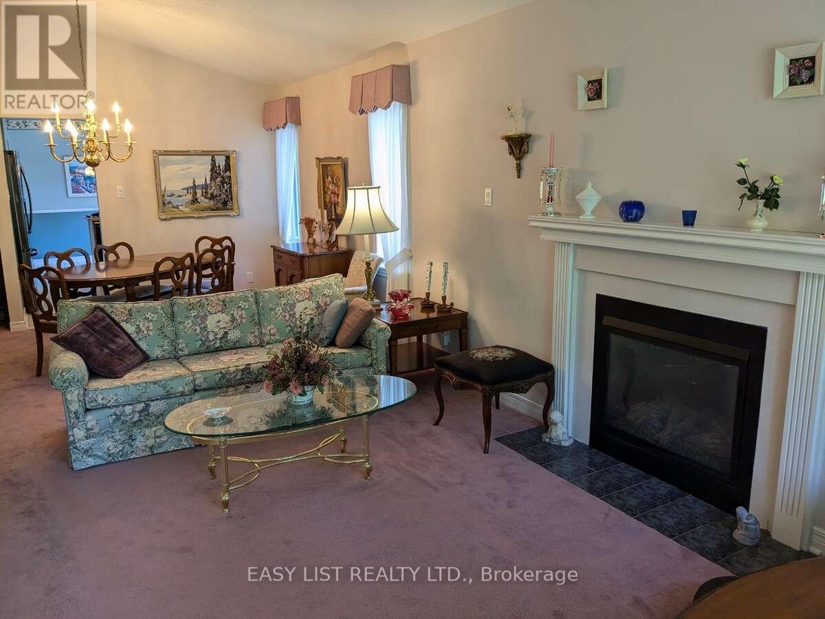 57 Goldfinch Drive, Ottawa, ON - Indoor Photo Showing Living Room With Fireplace