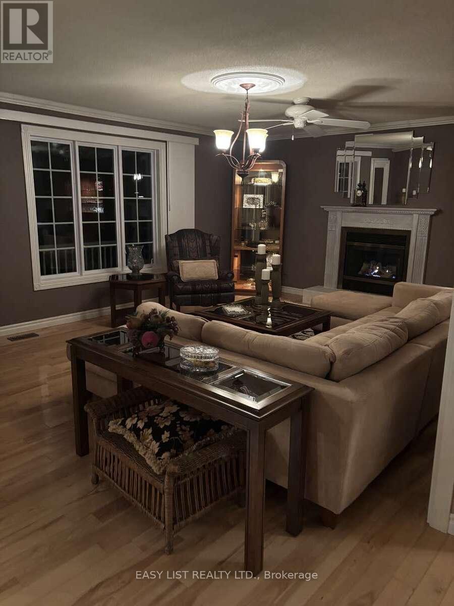 2 Joanne Crescent, Minto, ON - Indoor Photo Showing Living Room With Fireplace