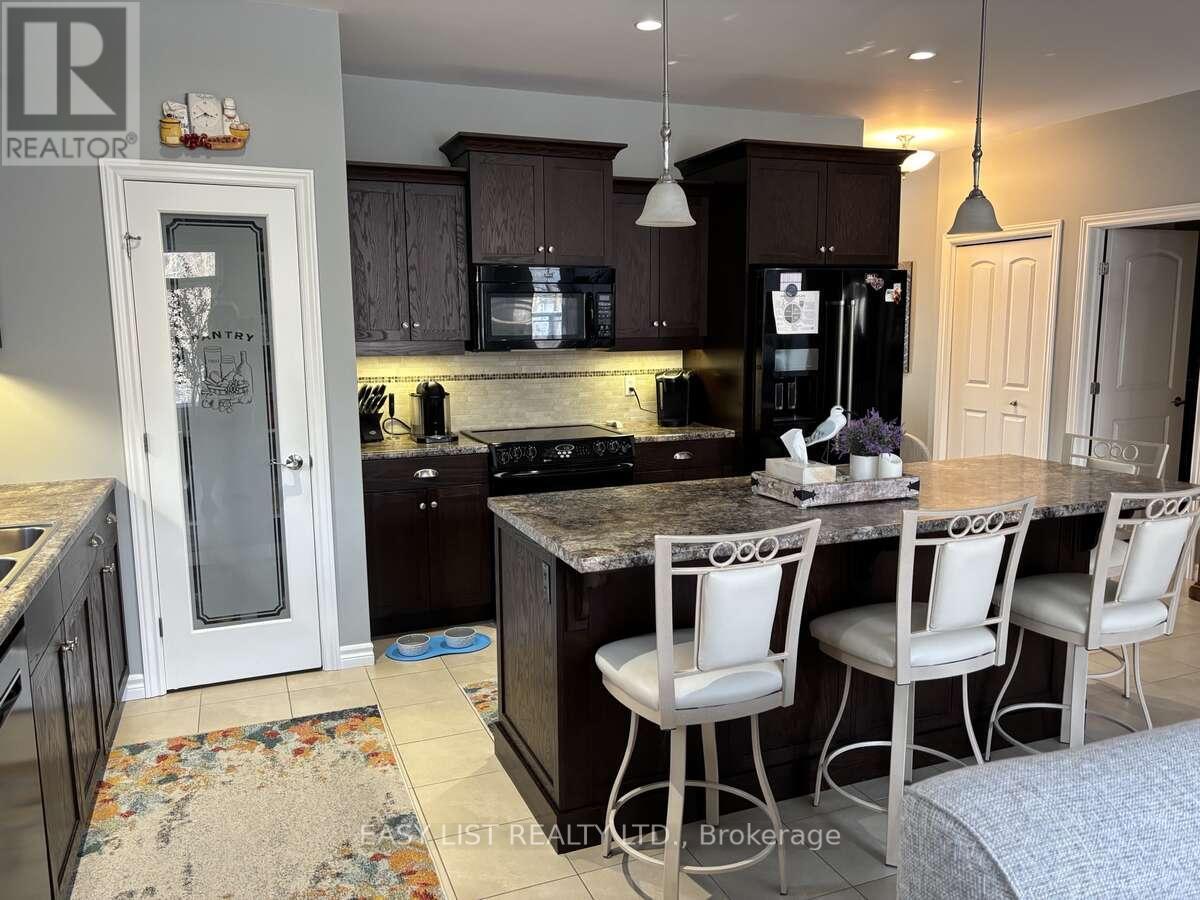 20 Ensley Place, Central Elgin, ON - Indoor Photo Showing Kitchen With Double Sink
