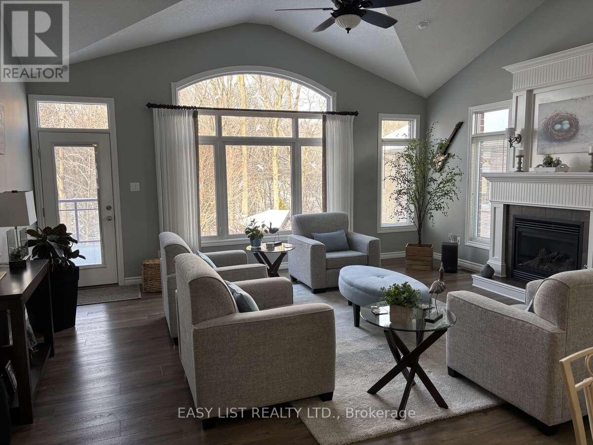 20 Ensley Place, Central Elgin, ON - Indoor Photo Showing Living Room With Fireplace
