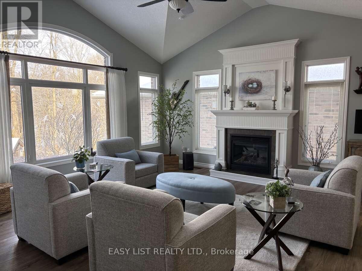 20 Ensley Place, Central Elgin, ON - Indoor Photo Showing Living Room With Fireplace