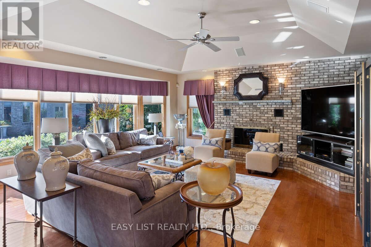 541 Kerr Crescent, Lakeshore, ON - Indoor Photo Showing Living Room With Fireplace